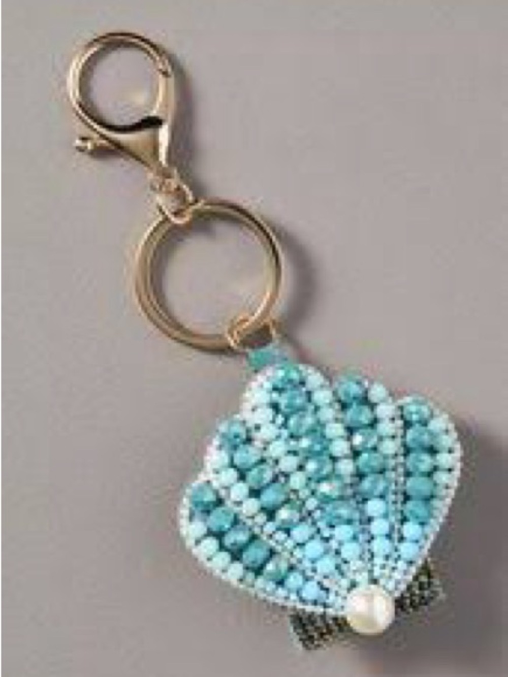 Anthropologie beaded shell bag charm